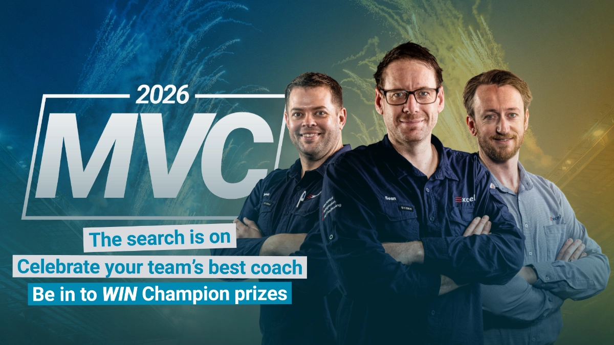 The three 2025 Most Valuable Coach winners in front of the MVC 2026 campaign mark