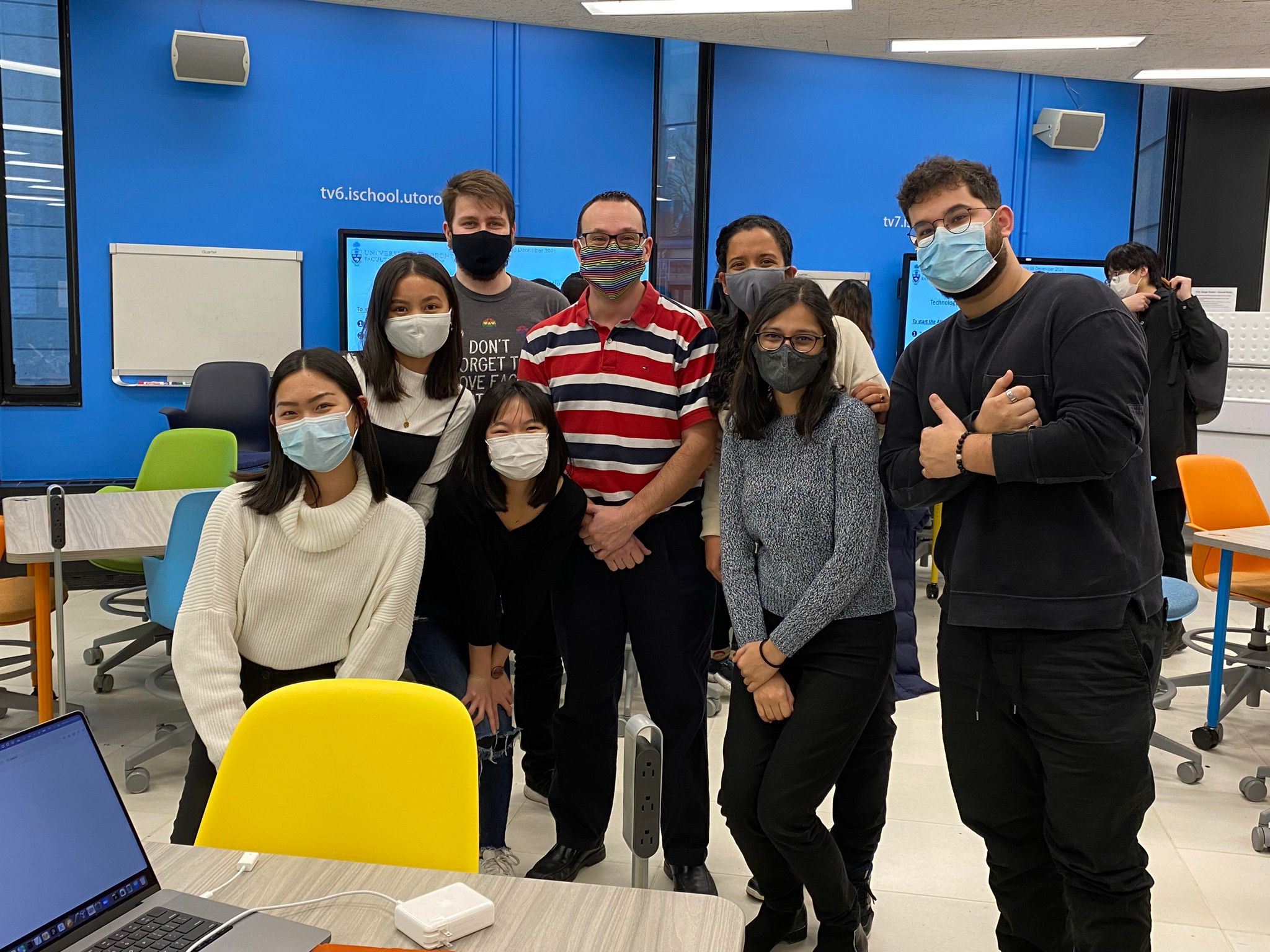 Team UHealth Plus with two professors in the classroom