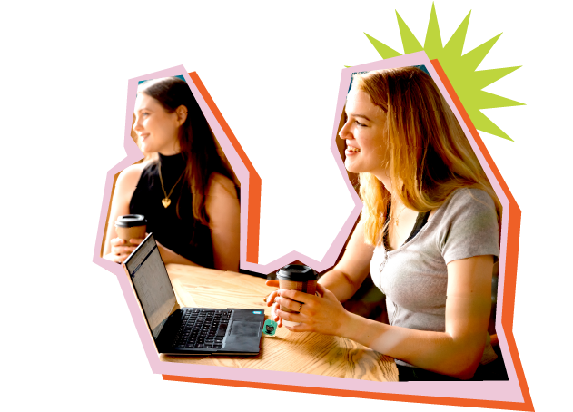 Two students looking at a laptop