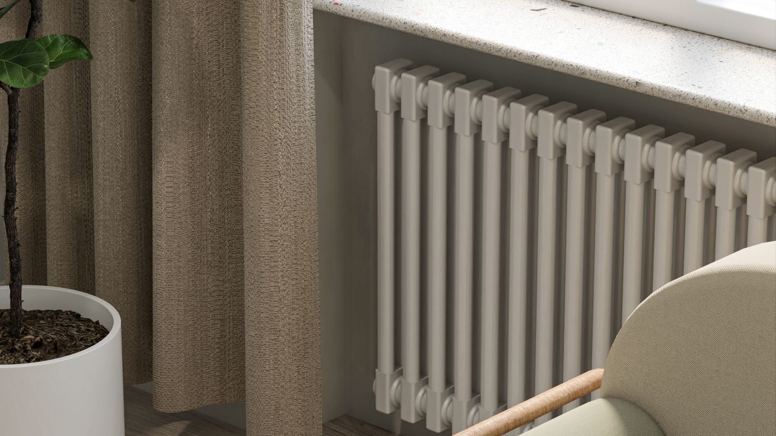 Radiateur près d’un canapé dans un appartement avec chauffage collectif