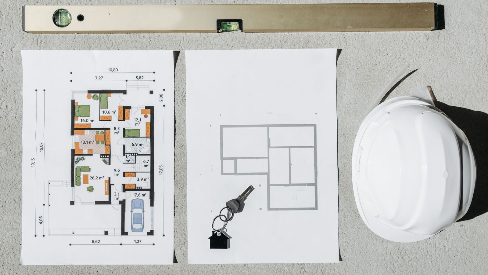 Plans et documents immobiliers préparés pour la réunion de deux appartements