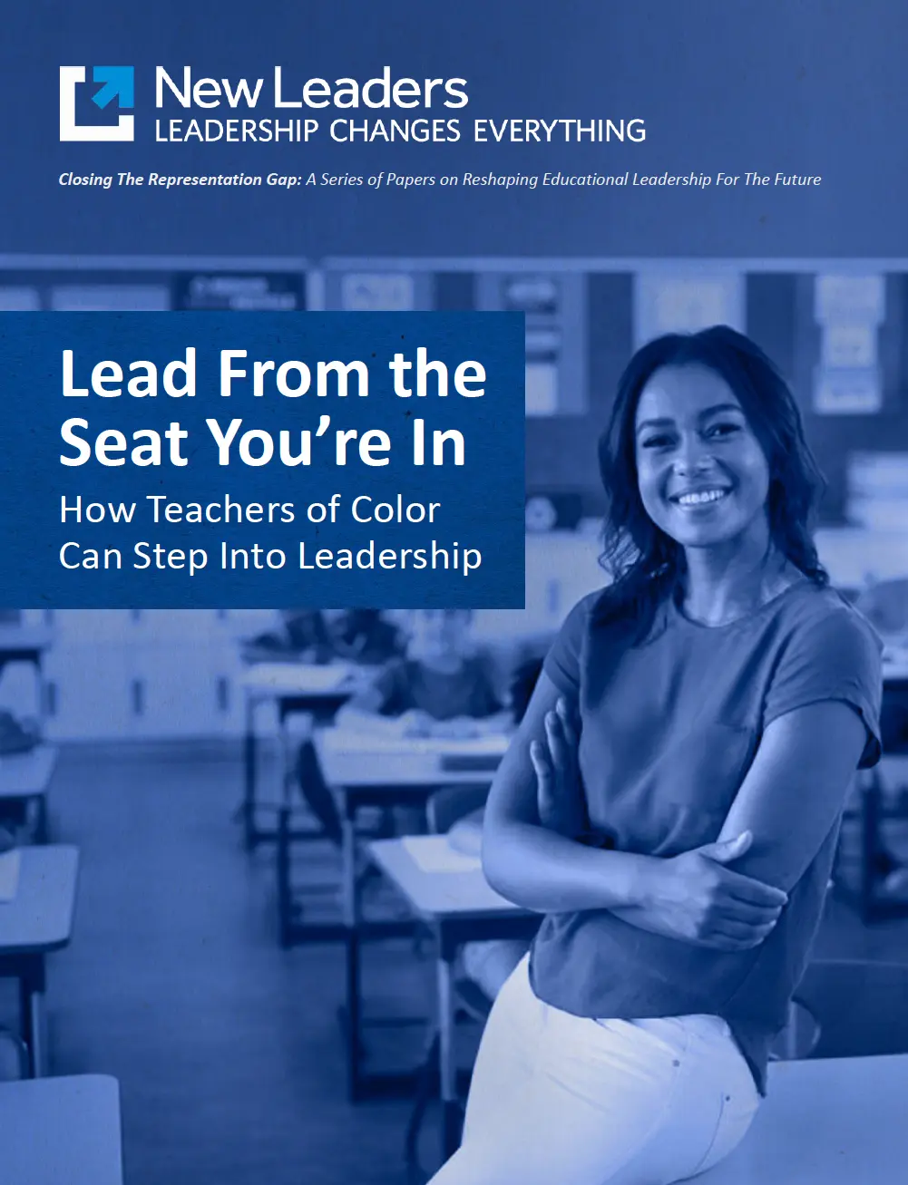 Blue poster with teacher leaning on a desk and heading: Lead from the seat you're in