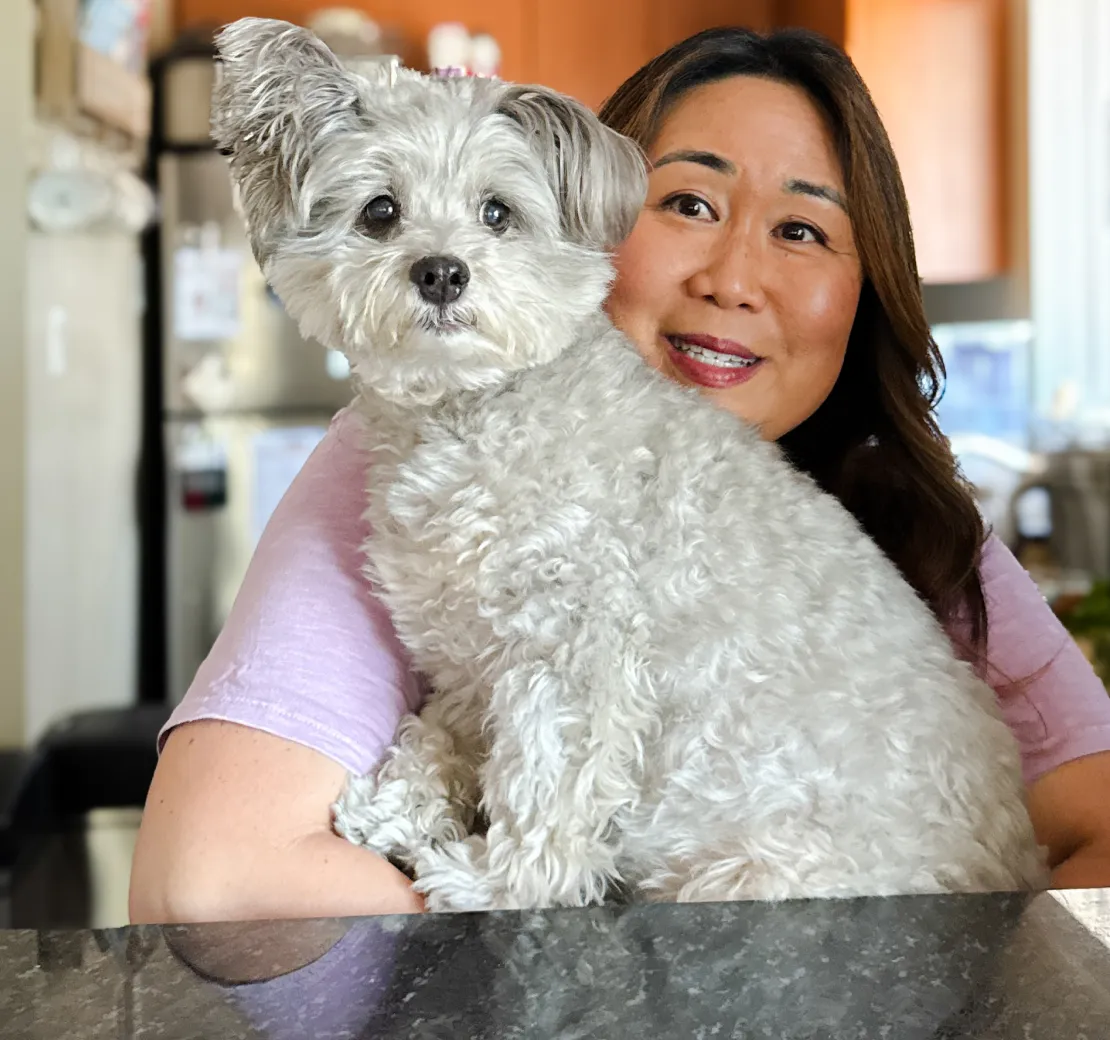 Coco Pop the dog with their mom.