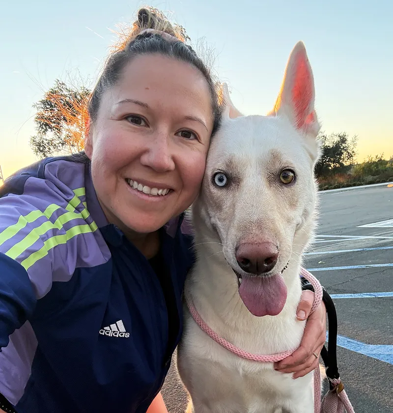 Quinn the dog posing with mom.