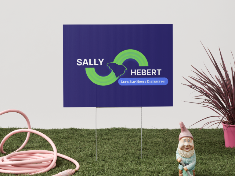 Yard sign on a lawn that reads "Sally Hebert. Let's Flip SC House District 94!"