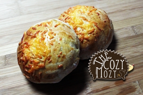 Cheesy stuffed garlic bread rolls good for a side or a snack. Easy to bake in the oven or throw the bread dough in a bread machine! Three components to pick and choose from.