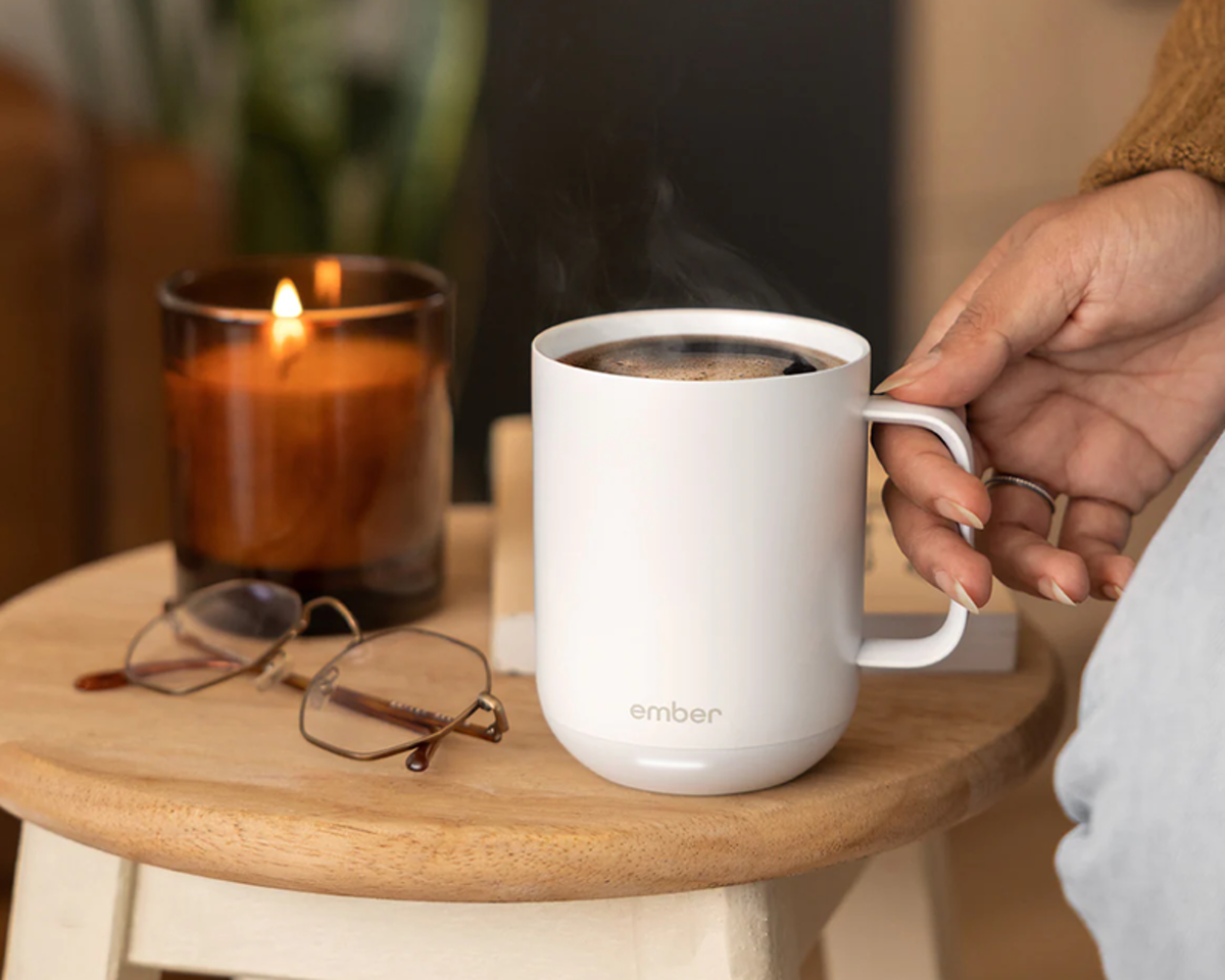 Ember temperature-control mug with steaming coffee