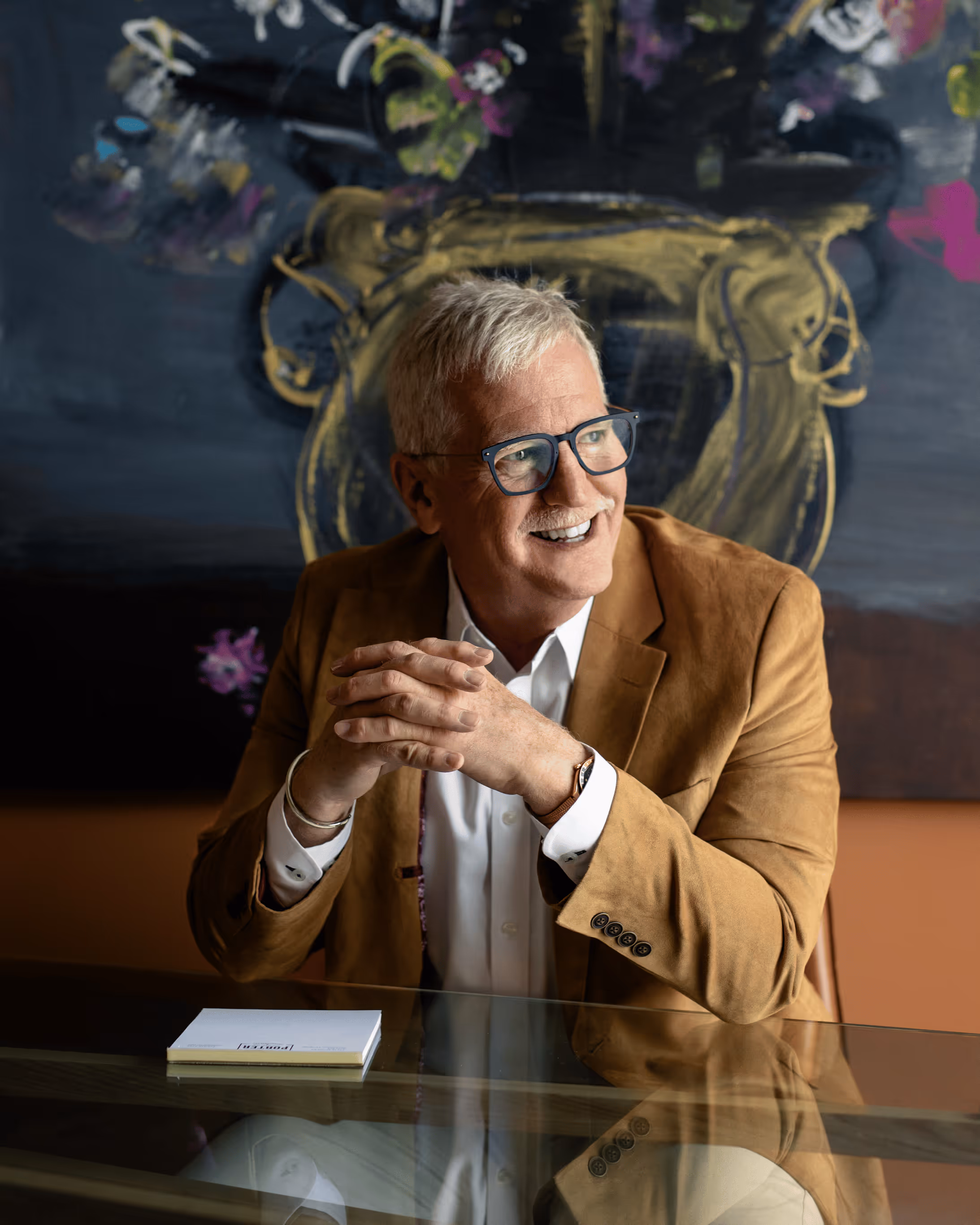 Portrait of Randel Porter seated at his desk in his office