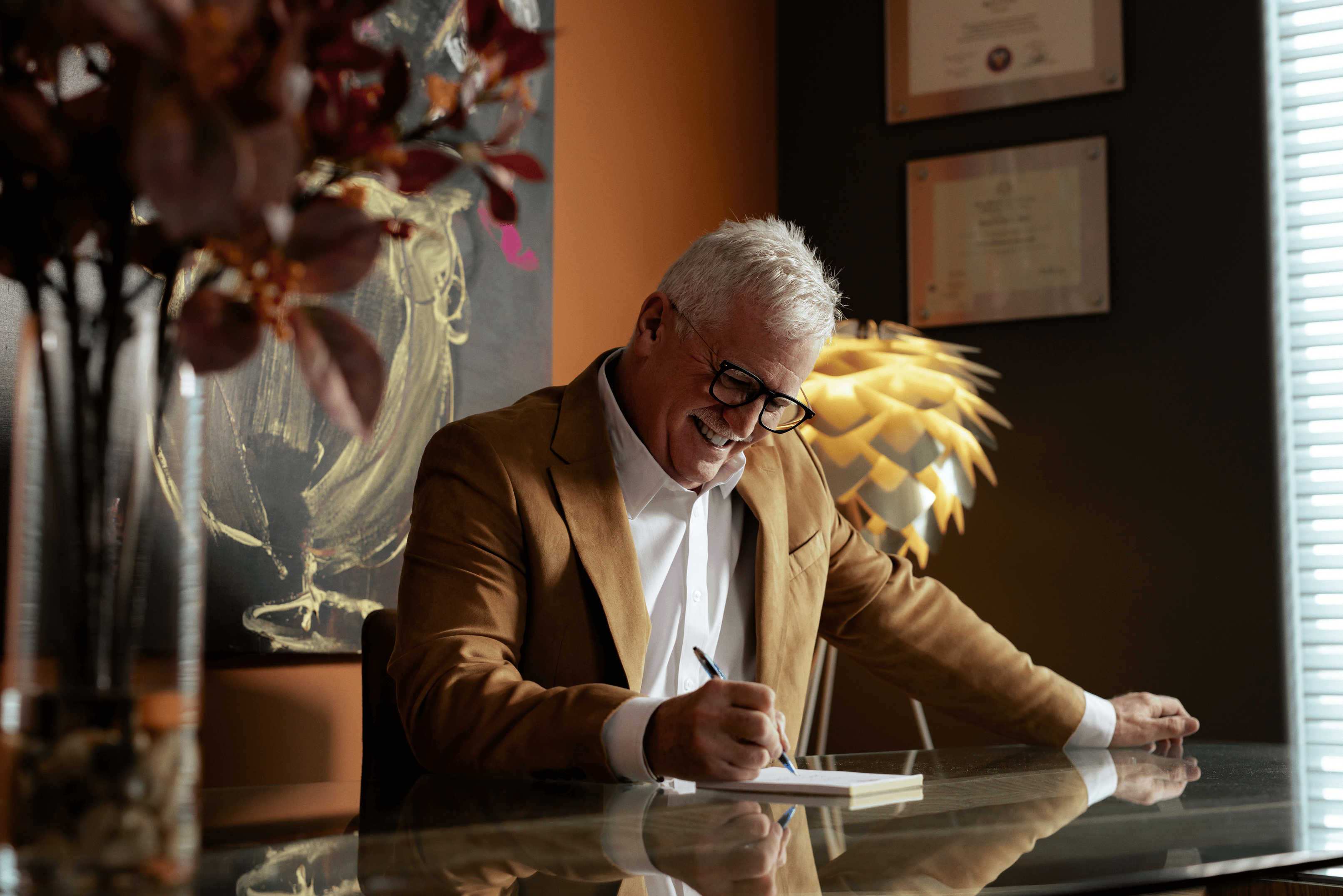 Portrait of Randel Porter seated at his desk in his office