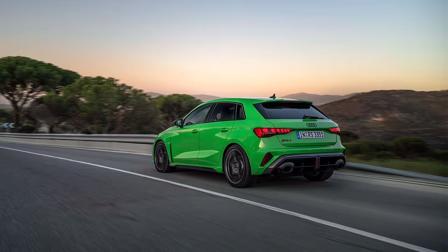 New Audi RS 3 rear quarter exterior in motion on-road