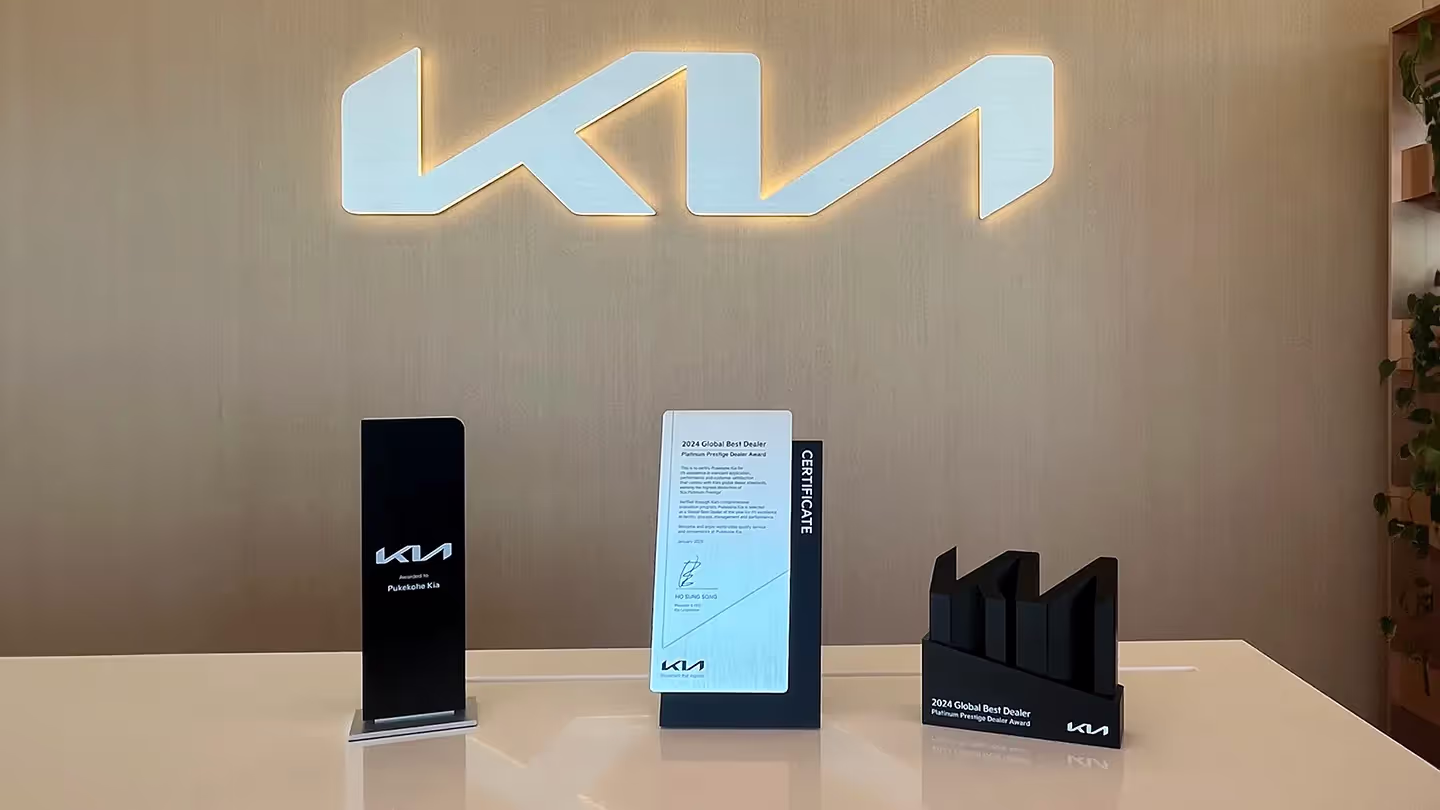 The Kia Platinum Prestige Dealer award and certificate recognition, now on display at Kia Pukekohe