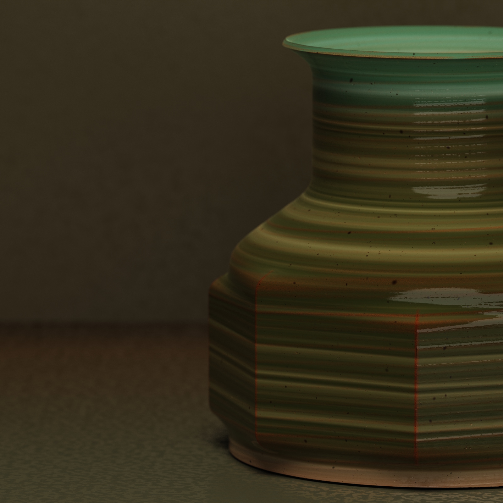 Close-up of a green ceramic vase with horizontal stripes on a textured surface and dark background.