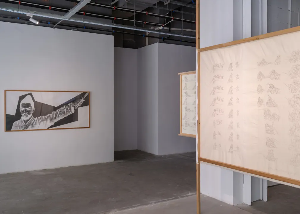 Installation view with One and a Half and hanging work