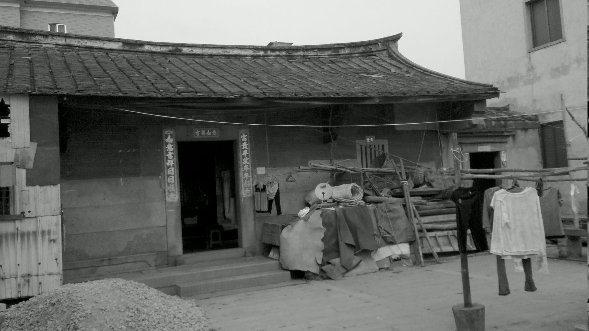 An old tiled-roof house in the village
