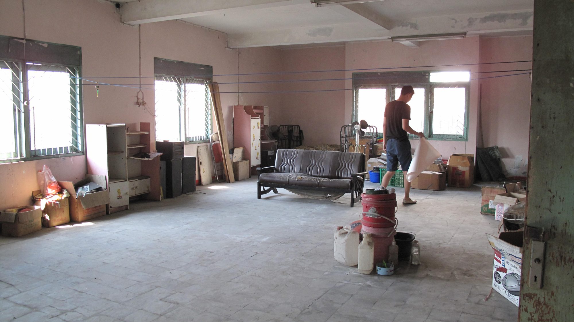 The bare main room of the childhood house
