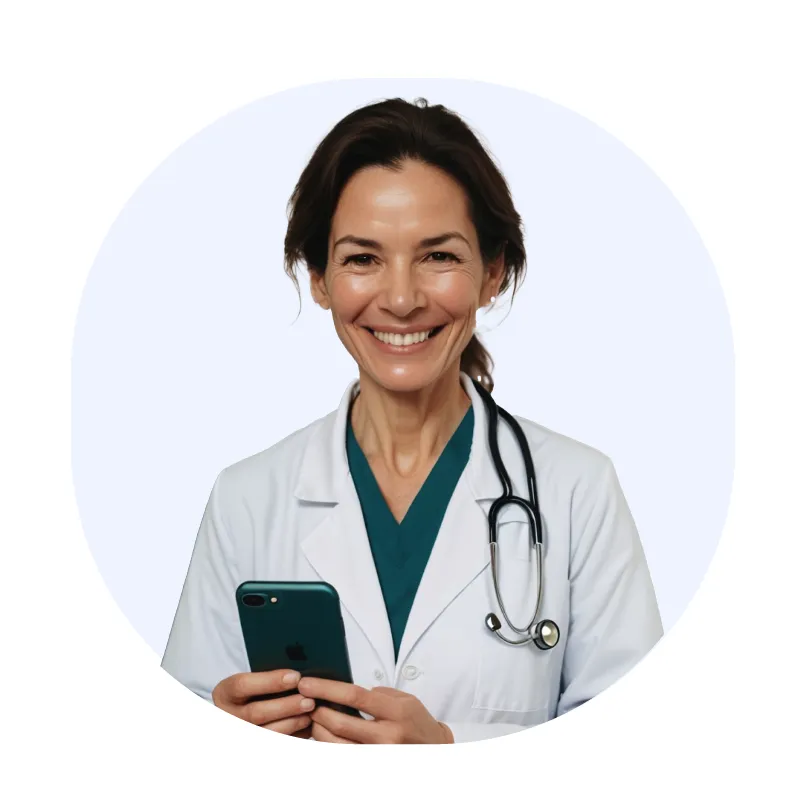 Smiling female doctor in white coat with stethoscope holding a smartphone.