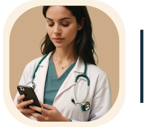 Female doctor wearing a white coat and stethoscope looking at her smartphone.