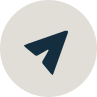 Dark blue paper airplane icon inside a light beige circular background.