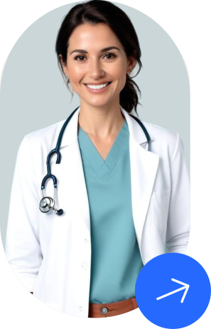 Smiling female doctor wearing a white coat and teal scrubs with a stethoscope around her neck.