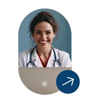 Smiling female doctor with stethoscope using a laptop.