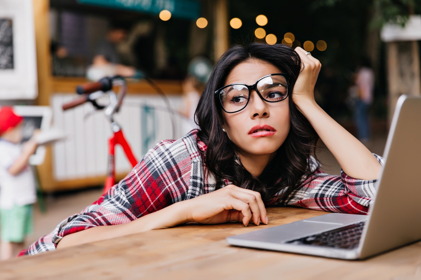 A frustrated woman looking at online content.