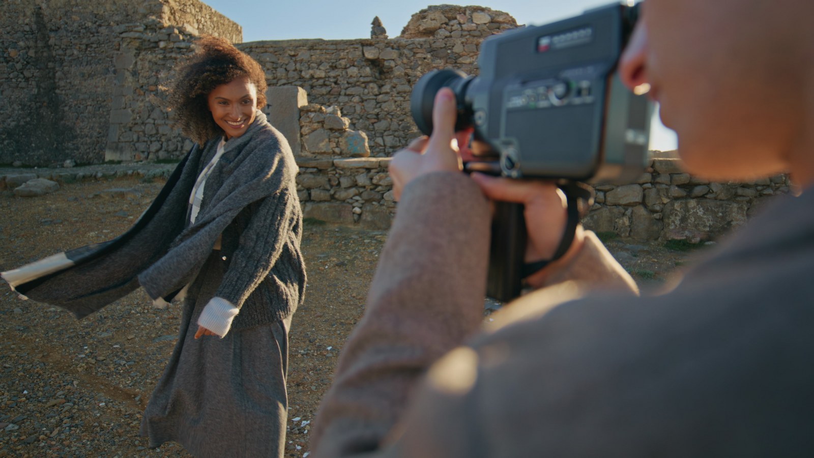 A group of professionals making a video at a scenic destination, questioning the ROI of a short-form video