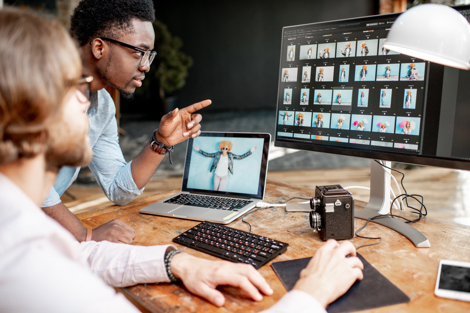Visual designers working on a video.