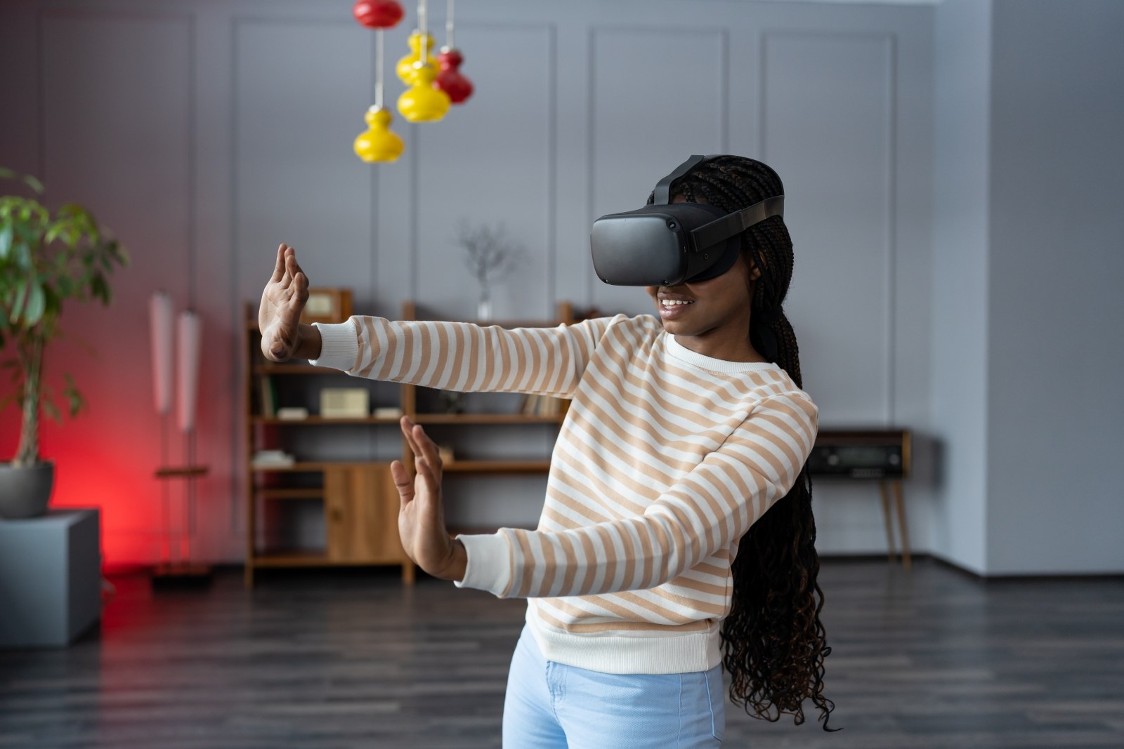 A girl using VR goggles.