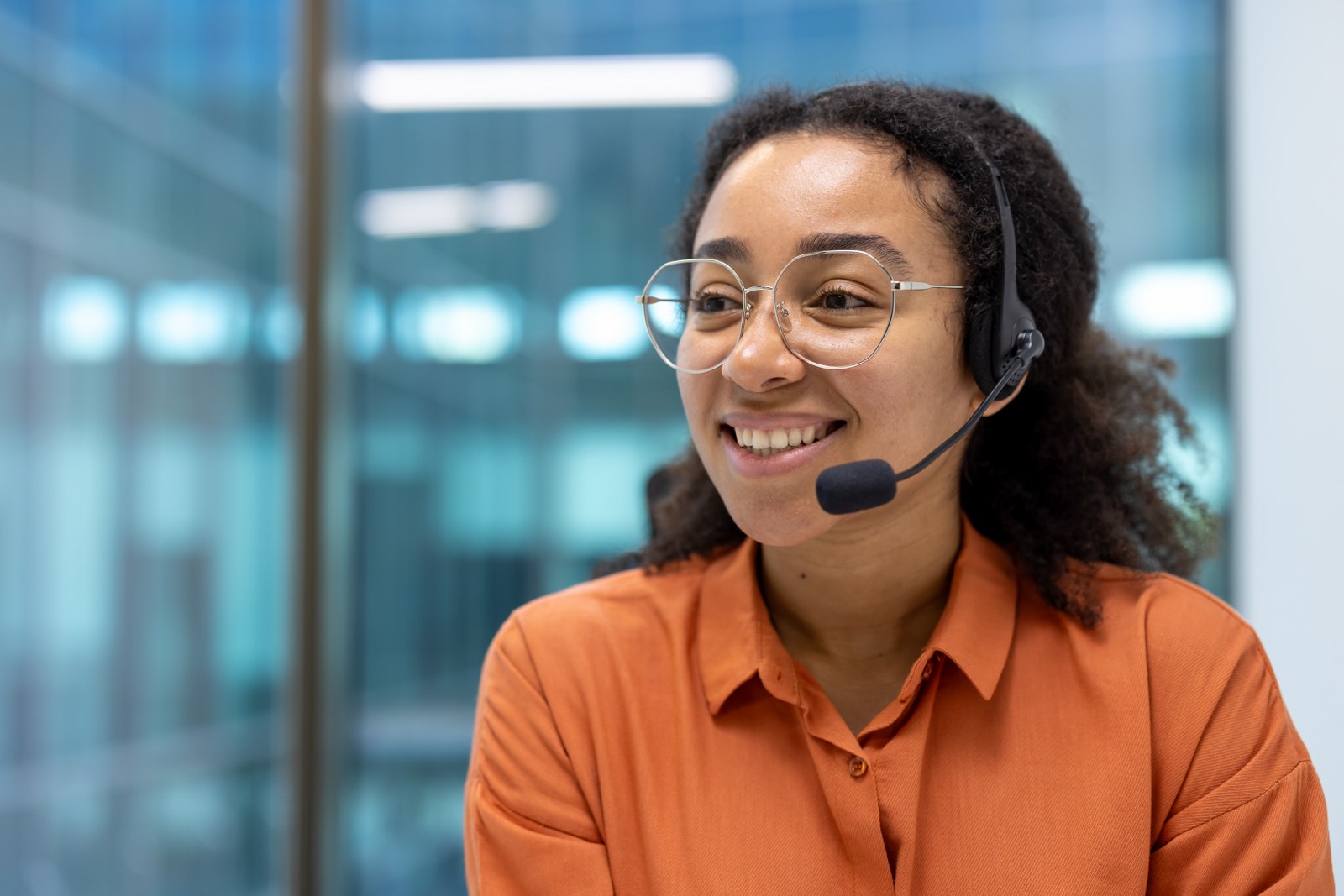 A smiling customer service agent.