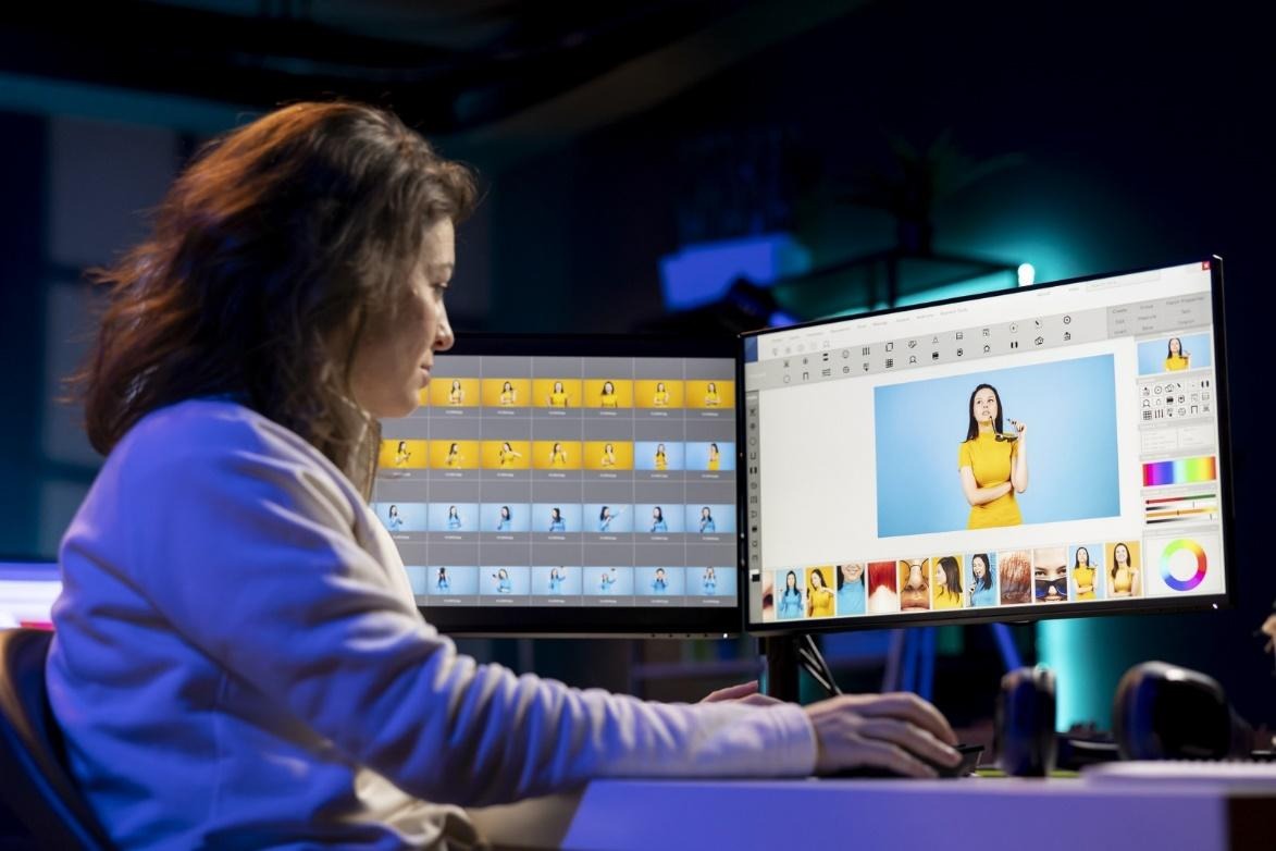 A visual designer working on color correction.