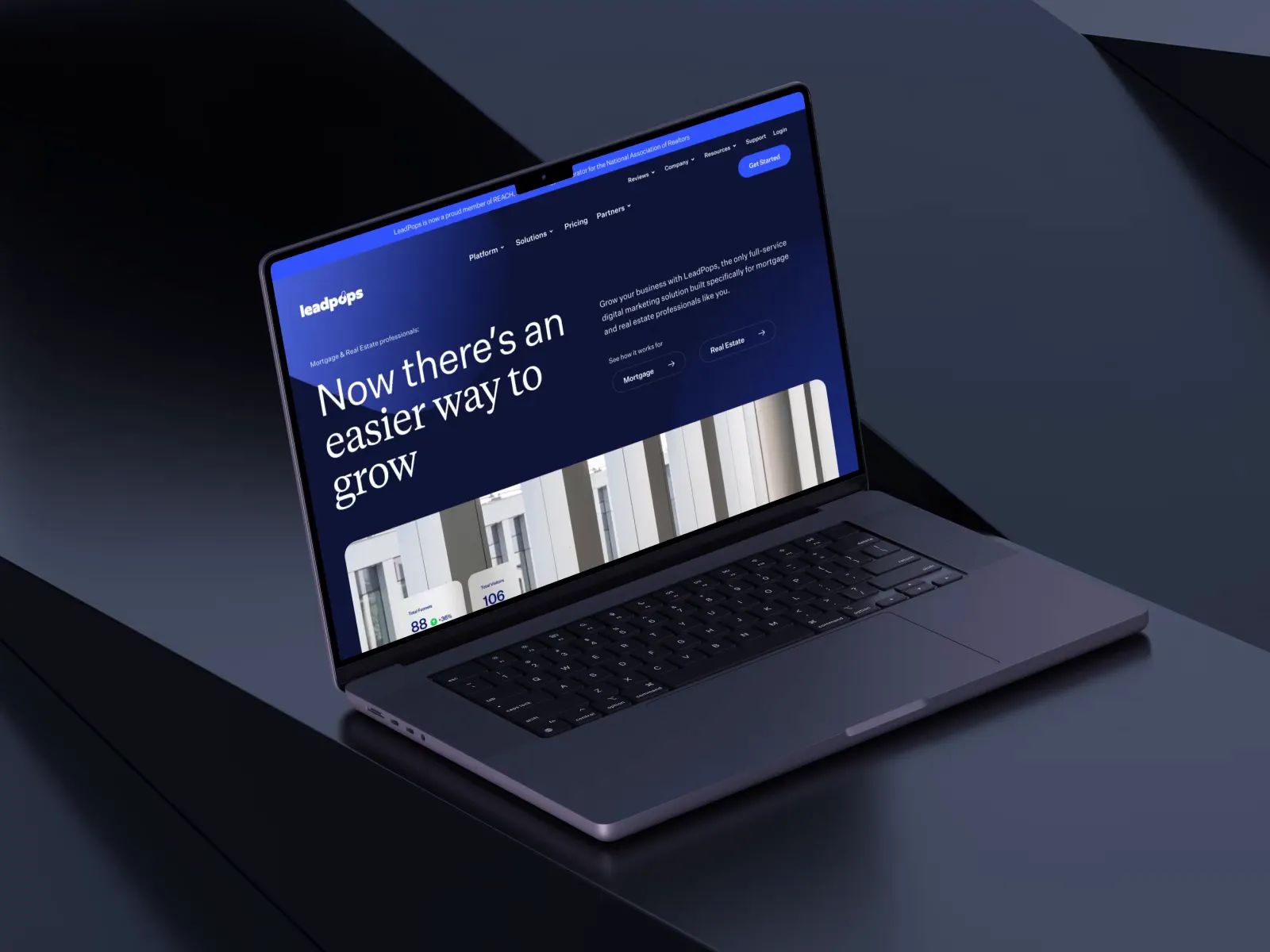 LeadPops homepage on a laptop, a managed mortgage lead generation service for brokers and real estate agents