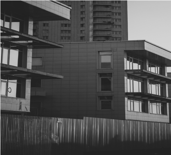 Townhouse buildings representing tokenized real estate assets on the blockchain.