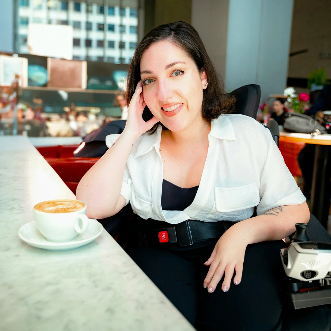Jessica Oddi with a cappuccino