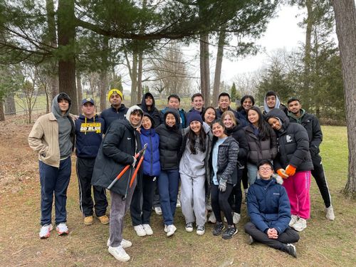 Community service event cleaning the arb