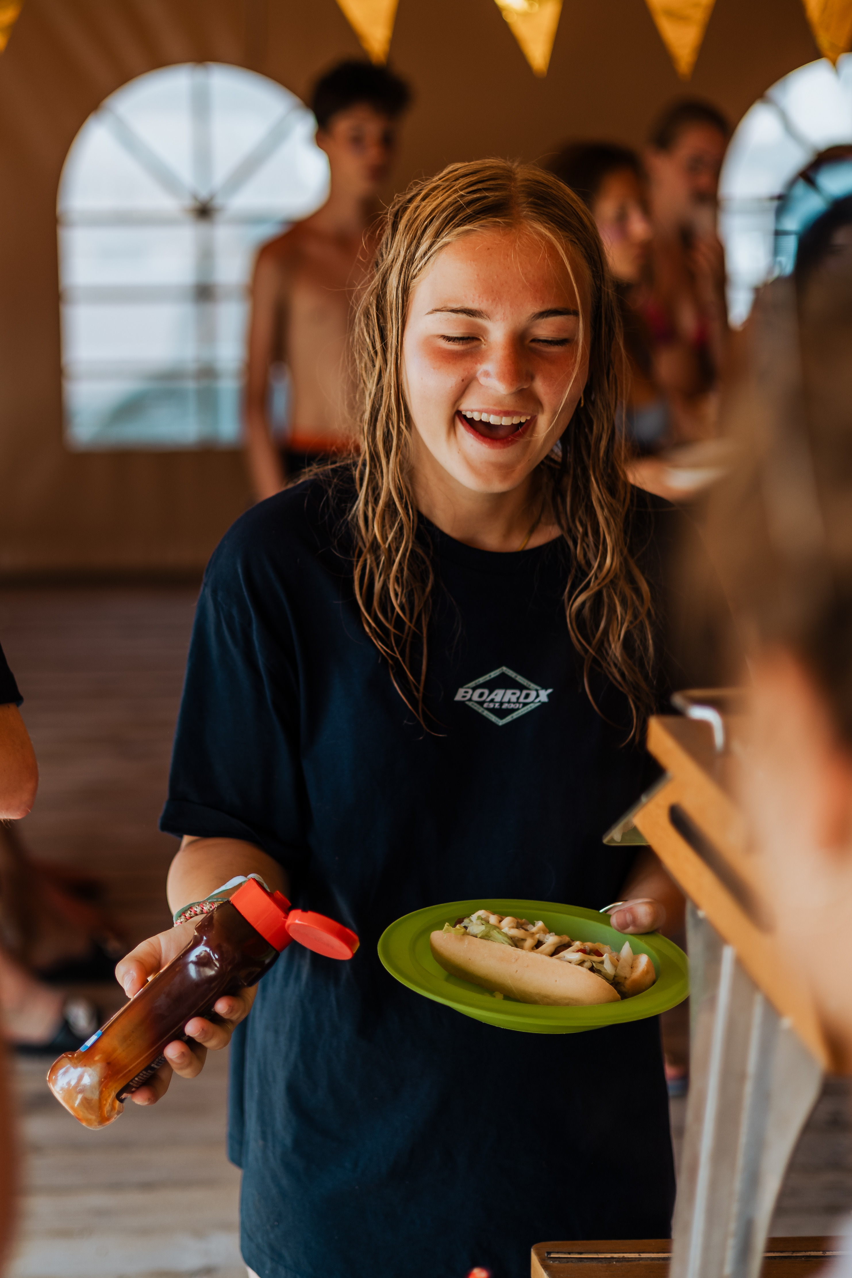 Coaching week - meisje met hotdog