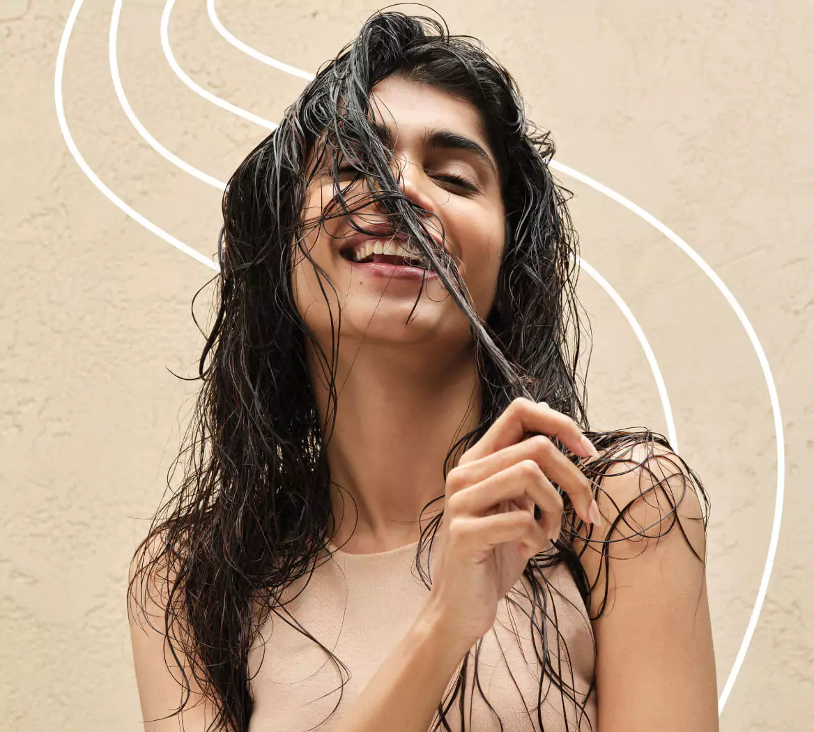How to tackle frizz and a flaky scalp this season