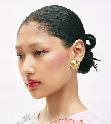 Cherry girl makeup is in—here’s what to buy to try it