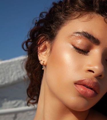 11 beauty buys that will transport you to your dream summer destination