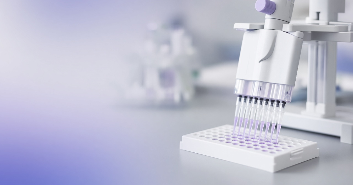 Multichannel pipette filling a plate row at once, representing lab efficiency