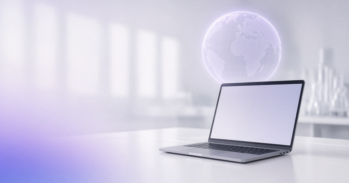 Wireframe globe above a laptop, representing web-based LIMS