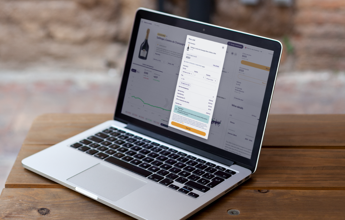CultX fine wine trading platform displayed on a laptop