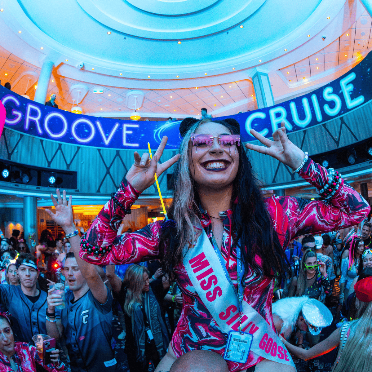 Groove Cruise festival attendee in crowd during DJ set