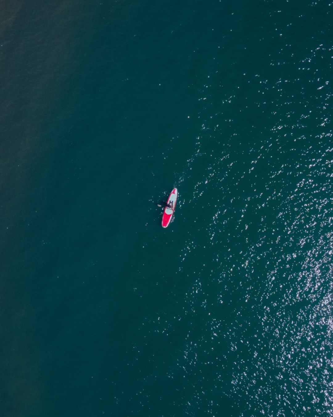 paddle boarder Carlsbad Lagoon Carlsbad, CA photo by Chrishaun Byrom