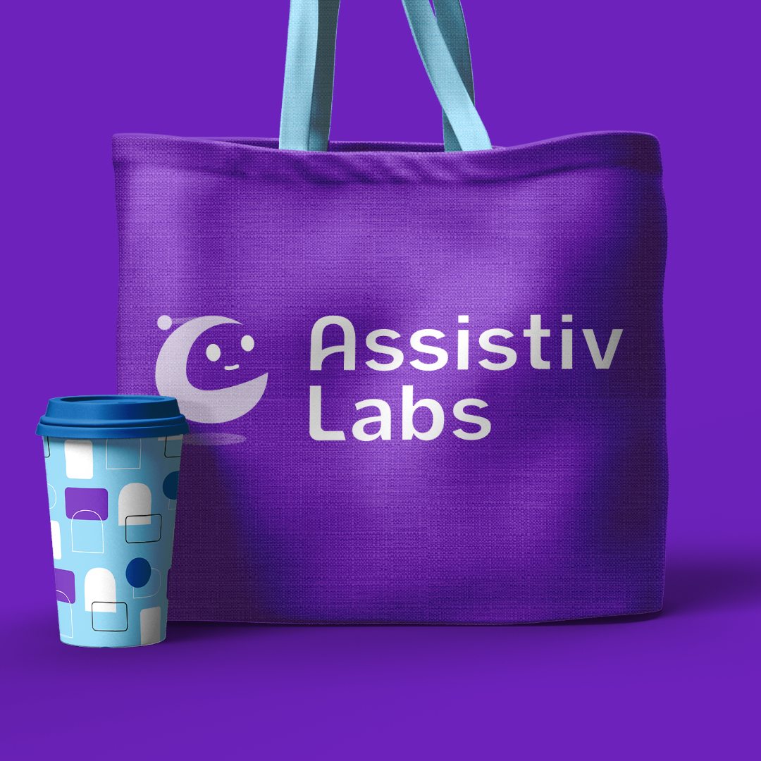 Assistiv Labs swag bag and coffee cup