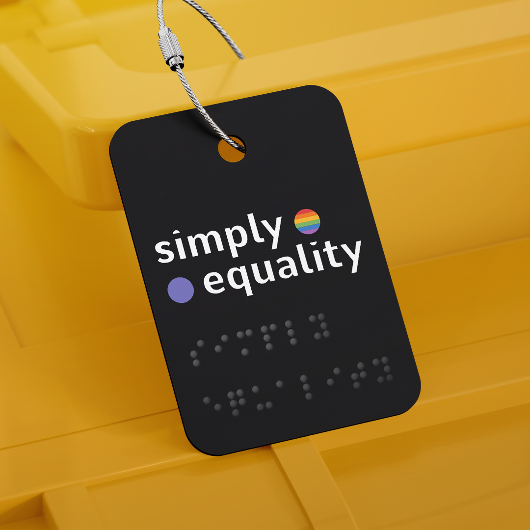 Simply Equality stacked logo with braille on a tag