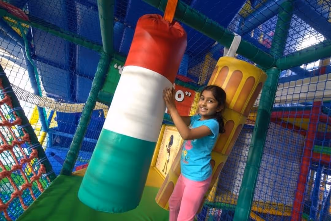 child playing in indoor play centre by Heswall