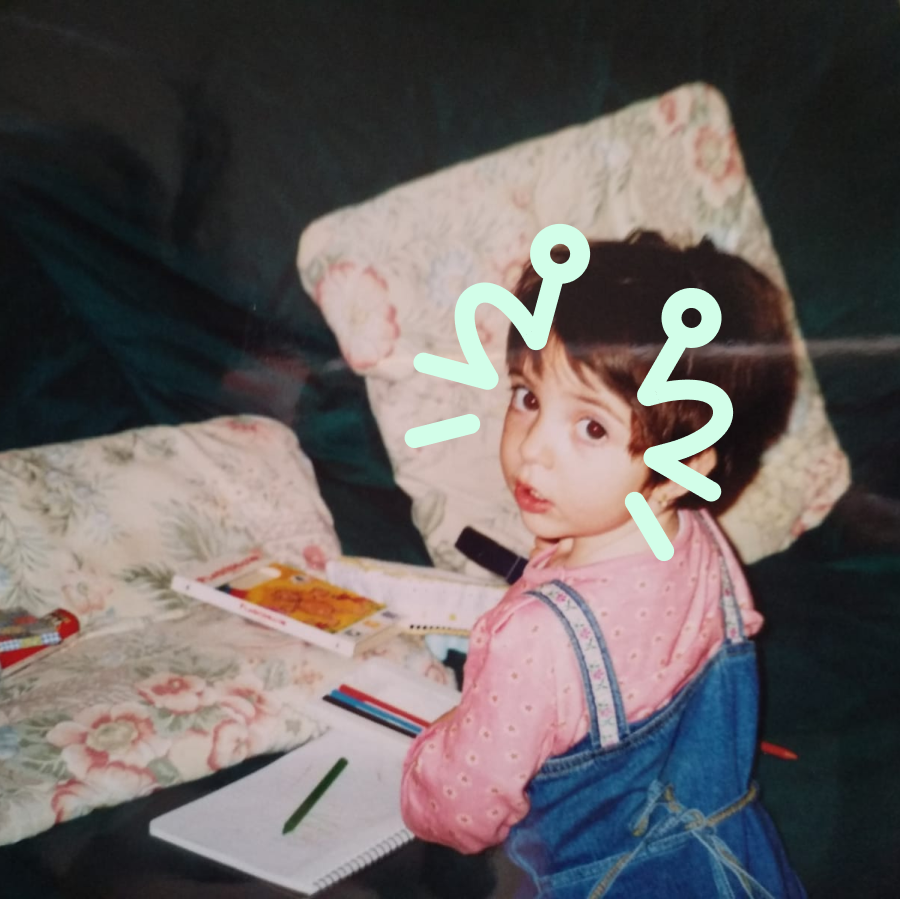 A picture of me as a child. I was drawing with crayons.