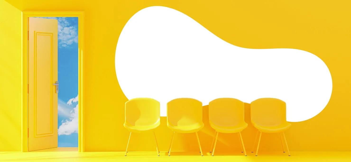 An overwhelmingly yellow room. There is an open door leading to a blue sky.