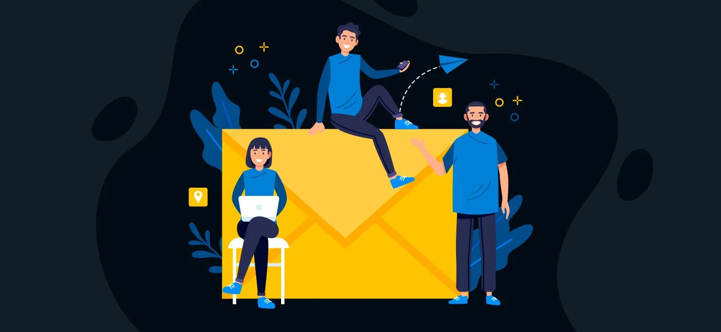 A creative team sits on a giant email icon.
