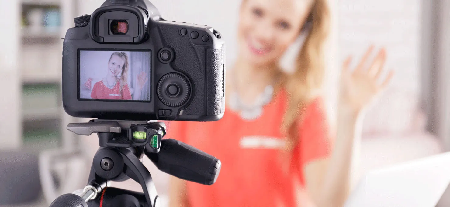 Filming a video to enhance video marketing strategies. 